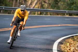 Athletic man riding a bike